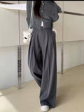 Pantalón ancho plisado gris